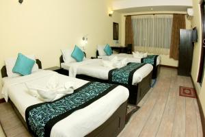 Letto o letti in una camera di Bag Packer's Lodge
