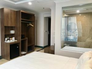 Voodi või voodid majutusasutuse Nature Hotel toas