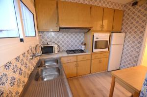 Kuchyňa alebo kuchynka v ubytovaní Apartamento centro de Lloret 8 people