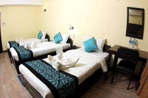 Letto o letti in una camera di Bag Packer's Lodge