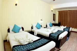Letto o letti in una camera di Bag Packer's Lodge