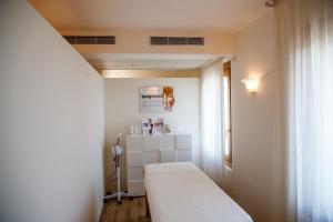 Postel nebo postele na pokoji v ubytování Phi Hotel Astoria + 37 fotografií