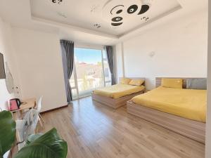 Postel nebo postele na pokoji v ubytování Duy Thanh hotel