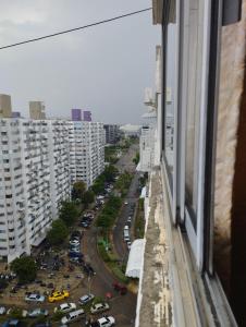 a view of a city street from a window of a building at NK hostel P2 16/30 in Ban Song Hong