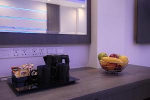 Příslušenství pro přípravu čaje a kávy v ubytování The Josephine Boutique Hotel