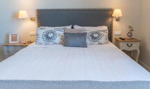 Łóżko lub łóżka w pokoju w obiekcie Phoenix Luxury Loft Cádiz