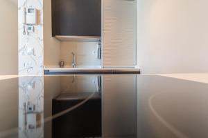 Kuchnia lub aneks kuchenny w obiekcie Phoenix Luxury Loft Cádiz