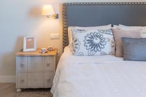 Łóżko lub łóżka w pokoju w obiekcie Phoenix Luxury Loft Cádiz
