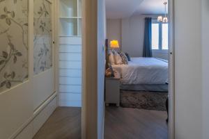 Łóżko lub łóżka w pokoju w obiekcie Phoenix Luxury Loft Cádiz