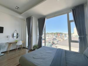 Postel nebo postele na pokoji v ubytování Duy Thanh hotel