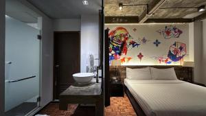 Postel nebo postele na pokoji v ubytování Cacha Hotel