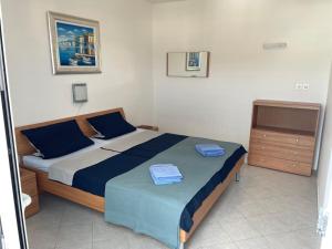 Posteľ alebo postele v izbe v ubytovaní Superior Rooms Sea Side View