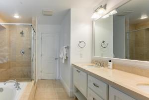 a bathroom with a tub and a sink and a shower at Milpitas 4br w garage nr mall dining SFO-1593 in Milpitas