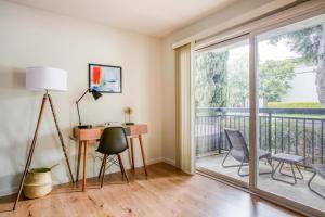 a home office with a desk and a balcony at Mountain View 1br w balcony pool nr shops SFO-1588 in Mountain View