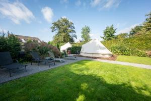 Zahrada ubytování Vakantievilla met zwembad, wellness en glamping in Paal/Beringen