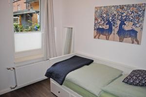 Postel nebo postele na pokoji v ubytování Ferienwohnung in der Altstadt