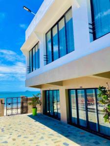 a house with a view of the ocean at Ramena Beach Hotel in Ramena