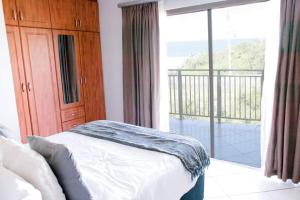 Ένα ή περισσότερα κρεβάτια σε δωμάτιο στο Carisford Creek +13 φωτογραφίες