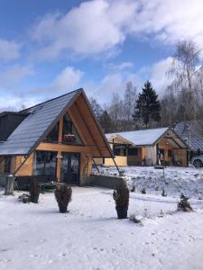 Acasă Straja - Casa Nordică om vinteren