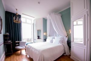 Postel nebo postele na pokoji v ubytování Chateau de Sacy