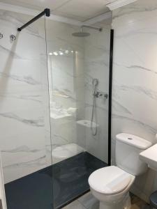 Um banheiro em Apartamentos HC Burriana Playa