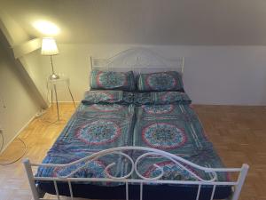 Кровать или кровати в номере Oberneulander Gästehaus