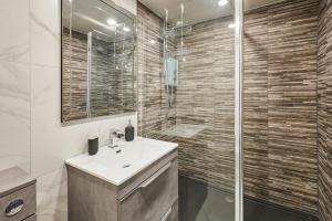 a bathroom with a sink and a shower at Host & Stay - Pâl Lodge in Holmfirth