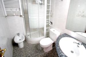 a bathroom with a toilet and a sink and a shower at Near Maresme Forum Apartment in Barcelona