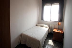 Posteľ alebo postele v izbe v ubytovaní Near Maresme Forum Apartment
