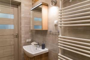 Koupelna v ubytování VacationClub – Bukowa 17A Apartament E.1 + 19 fotografií