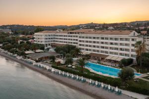 an aerial view of a hotel next to the water at Elea Beach Hotel in Dassia