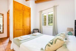 Postel nebo postele na pokoji v ubytování Villa Rouss