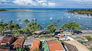 a view of a harbor with boats in the water at Vila Casarão Verde in Itacaré