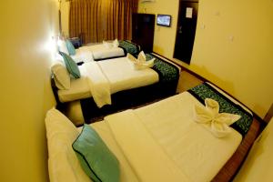 Letto o letti in una camera di Bag Packer's Lodge