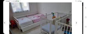 Ένα ή περισσότερα κρεβάτια σε δωμάτιο στο Chambre Relax Détente