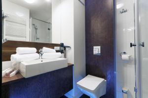 Kúpeľňa v ubytovaní Apartamenty Jozefina