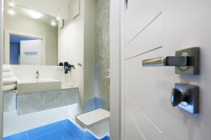 Kúpeľňa v ubytovaní Apartamenty Jozefina + 10 fotografií
