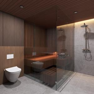 La salle de bains est pourvue d'une douche et de toilettes. dans l'établissement Aurora Collection, à Saariselka