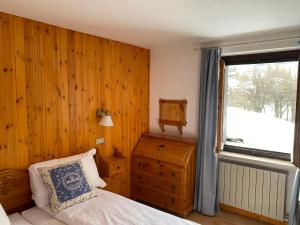 Postel nebo postele na pokoji v ubytování Hotel Col Serena