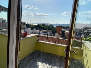 a balcony with a view of the city at Şehir Merkezinde,Dublex apartman in Çanakkale