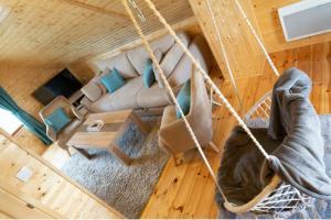 an overhead view of a living room with a swing at House Negro Žabljak in Žabljak
