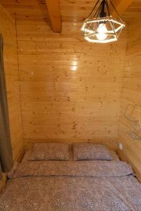 Una cama o camas en una habitación de House Negro Žabljak