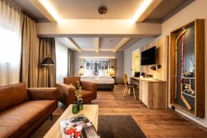 TV a/nebo společenská místnost v ubytování Hotel HerzogsPark