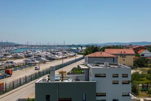 a view of a marina from a building at Villa Nadja ZadarVillas in Bibinje +31 photos