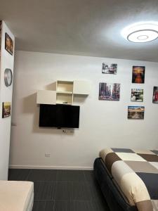 Postel nebo postele na pokoji v ubytování Apartment Tazzoli 11