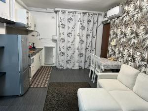 Kuchyň nebo kuchyňský kout v ubytování Apartment Tazzoli 11