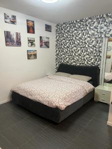 Postel nebo postele na pokoji v ubytování Apartment Tazzoli 11