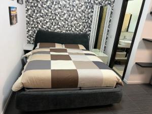 Postel nebo postele na pokoji v ubytování Apartment Tazzoli 11