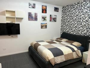 Postel nebo postele na pokoji v ubytování Apartment Tazzoli 11