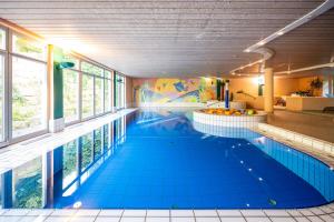 Bazén v ubytování Hotel HerzogsPark nebo v jeho okolí